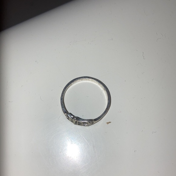 This ring is normal size and it’s silver - Picture 2 of 4